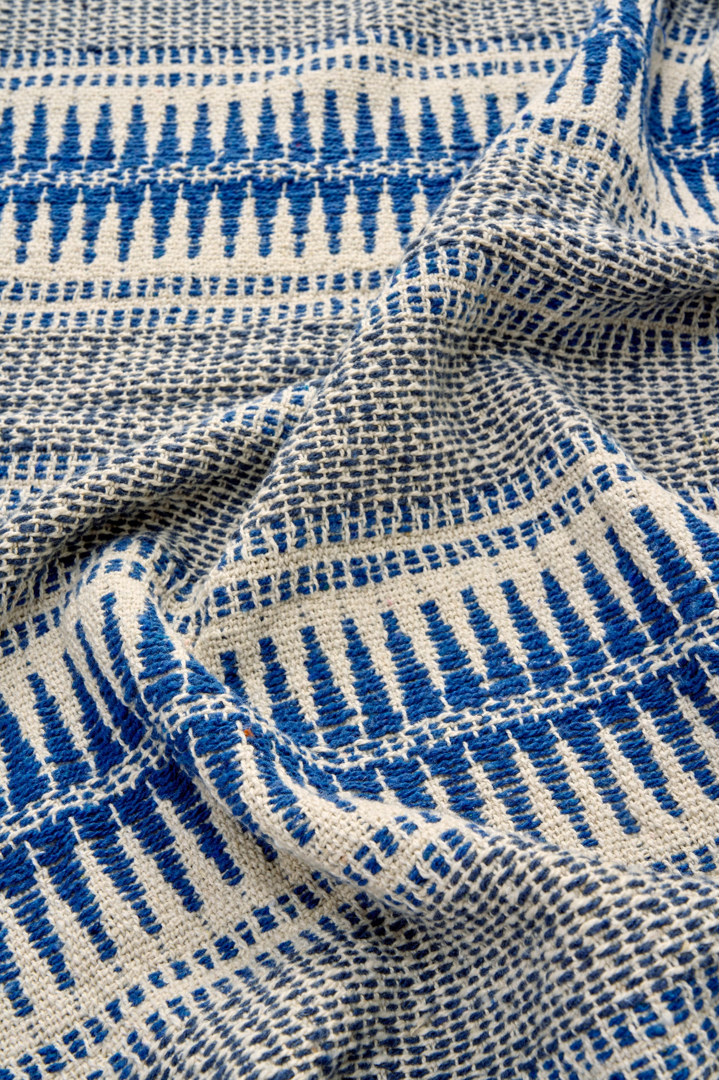 Cotton throw in blue, off white and grey | Minerva Interiors