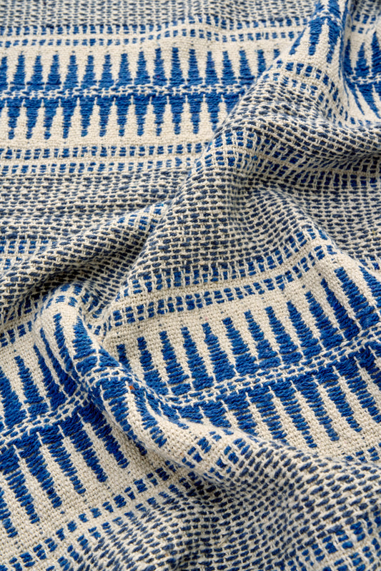 Cotton throw in blue, off white and grey | Minerva Interiors