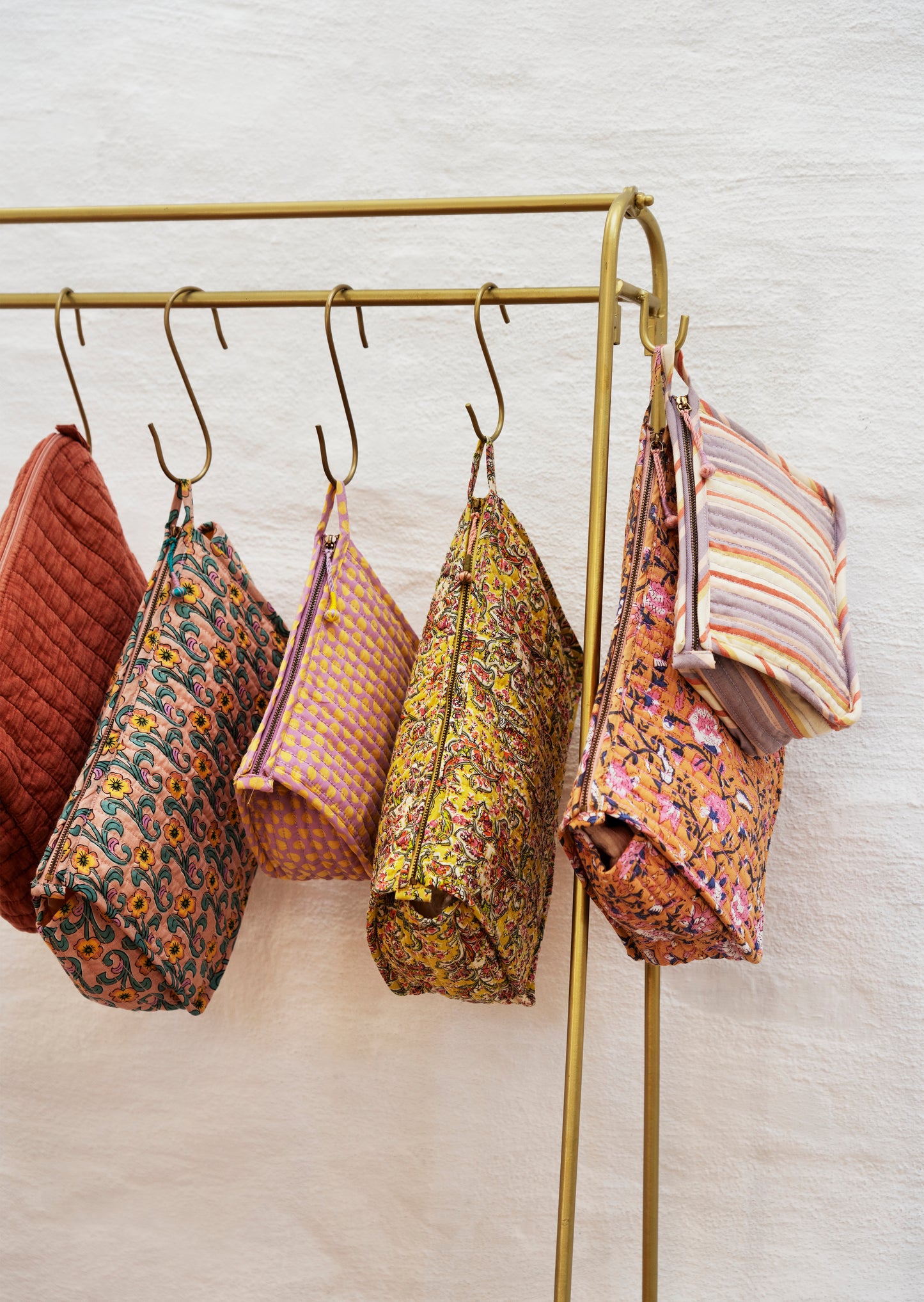 Quilted wash bag in mahogany | Minerva Interiors