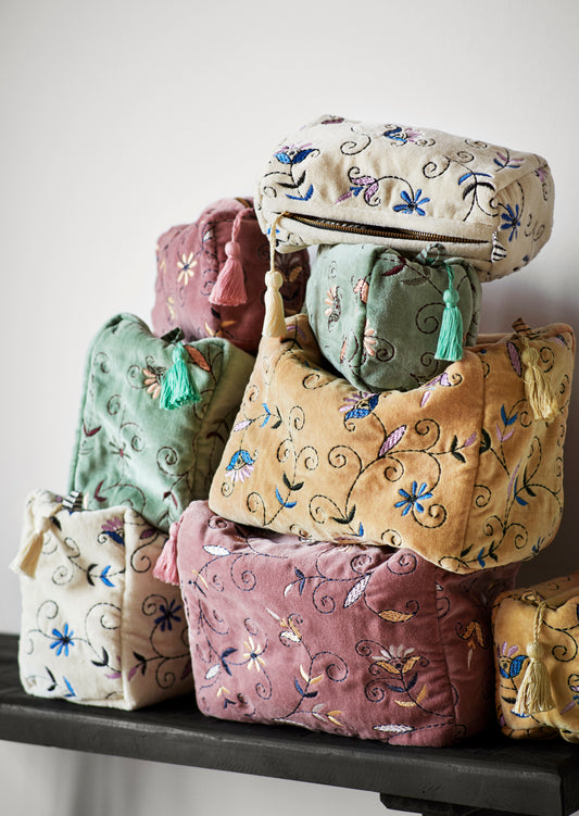 Embroidered velvet wash bag in hemp, blue, pink and black | Minerva Interiors