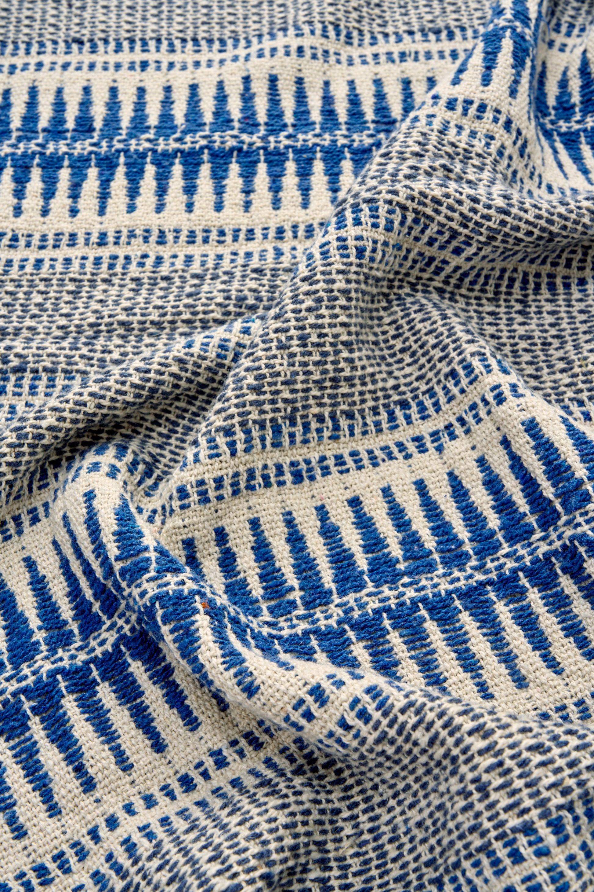 Cotton throw in blue, off white and grey | Minerva Interiors