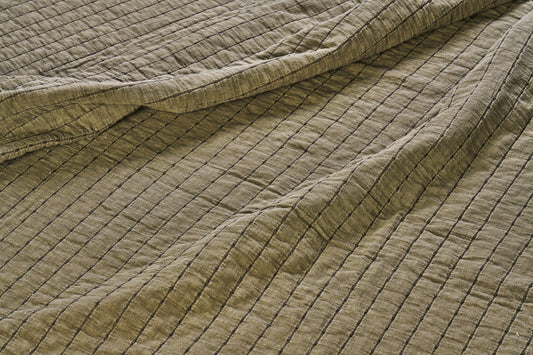 Quilted cotton bed cover and throw in khaki and dark green | Minerva Interiors