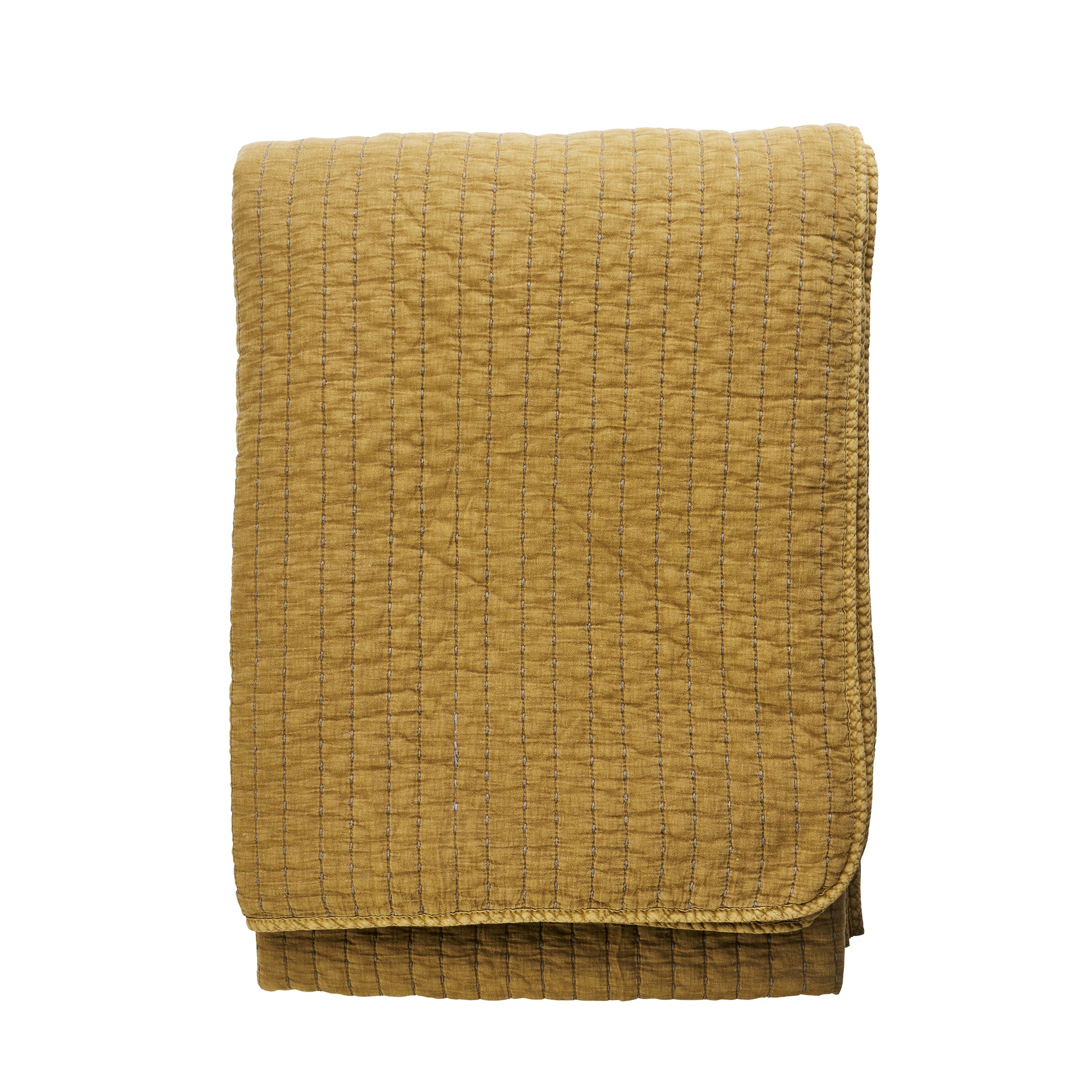 Quilted cotton bed cover in mustard gold and grey | Minerva Interiors