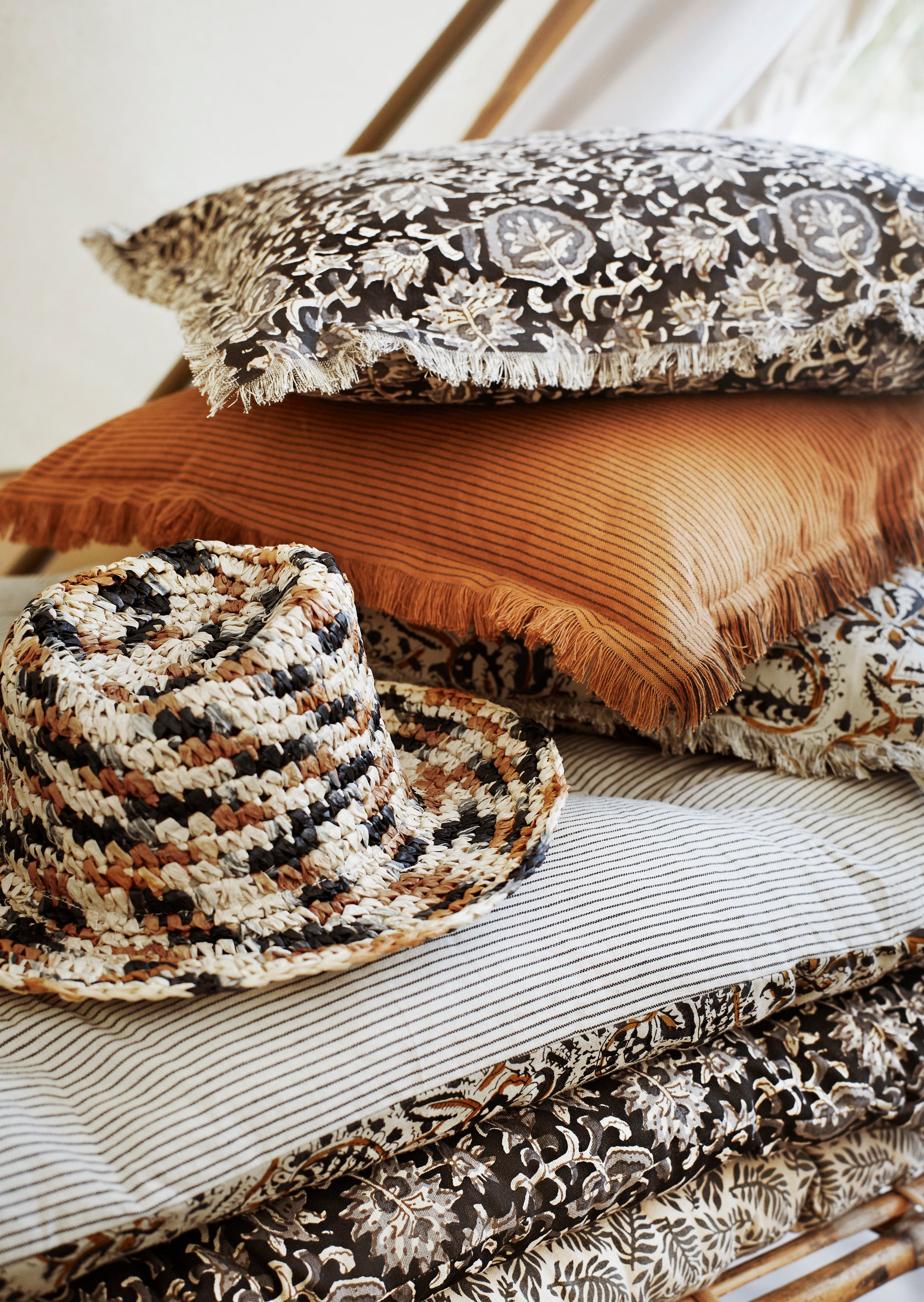 Cushion cover with fringe edge in sugar almond and black | Minerva Interiors