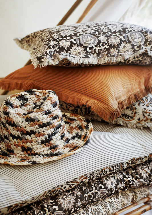 Cushion cover with fringe edge in sugar almond and black | Minerva Interiors