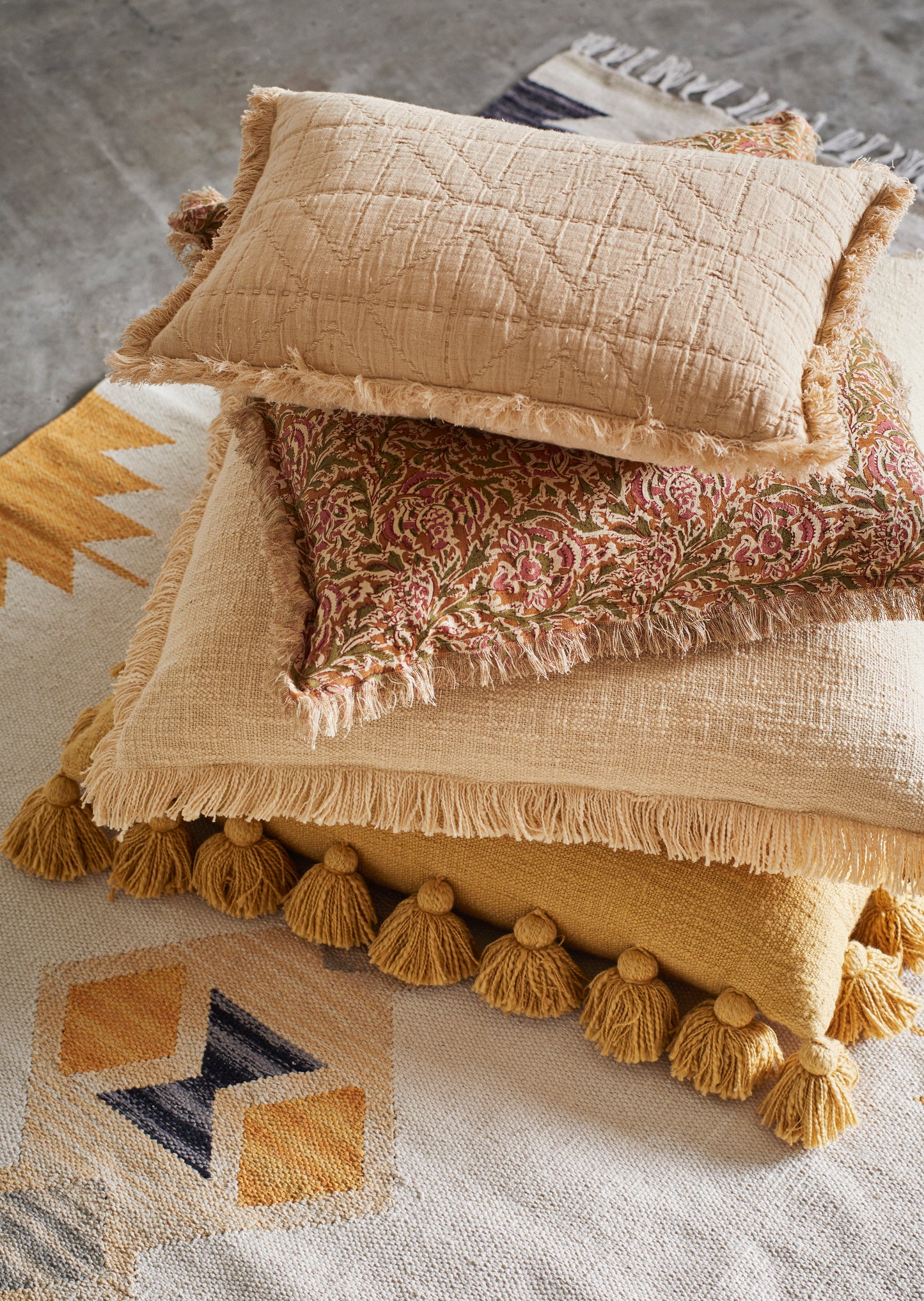 Cushion cover with fringe edge in honey, rose, green and off white | Minerva Interiors