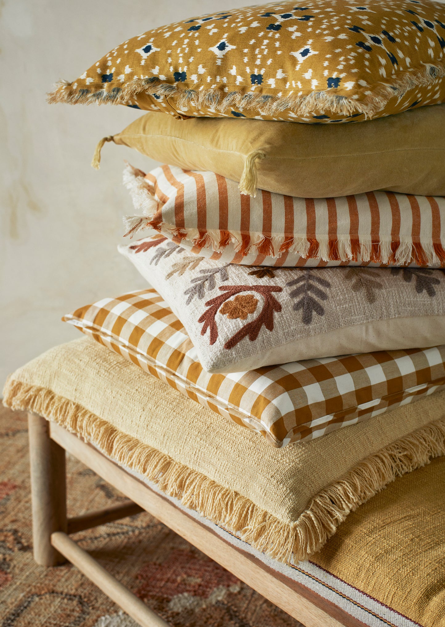 Velvet cushion cover with tassel detail in hemp | Minerva Interiors