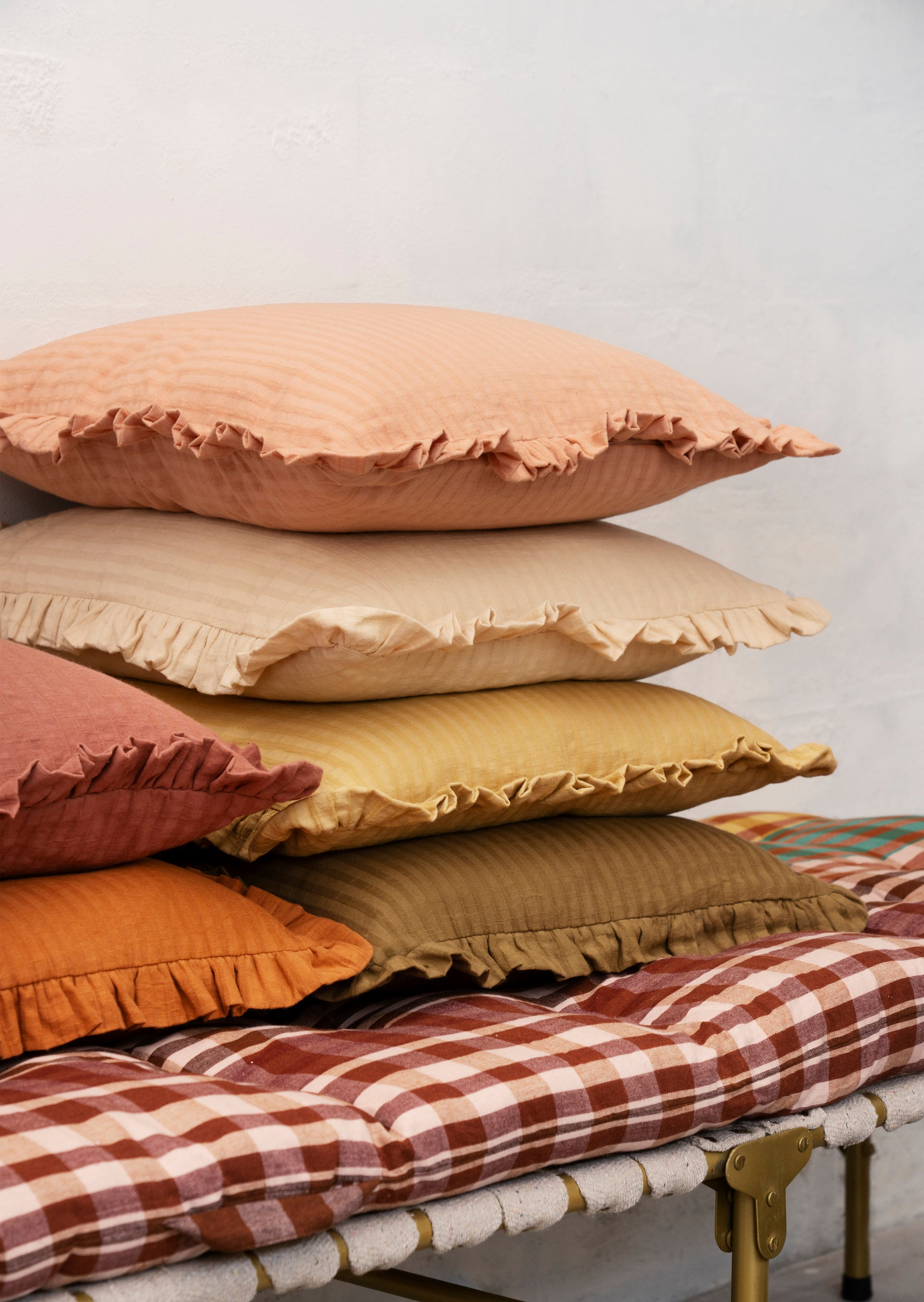 Cushion cover with ruffle edge in rust | Minerva Interiors