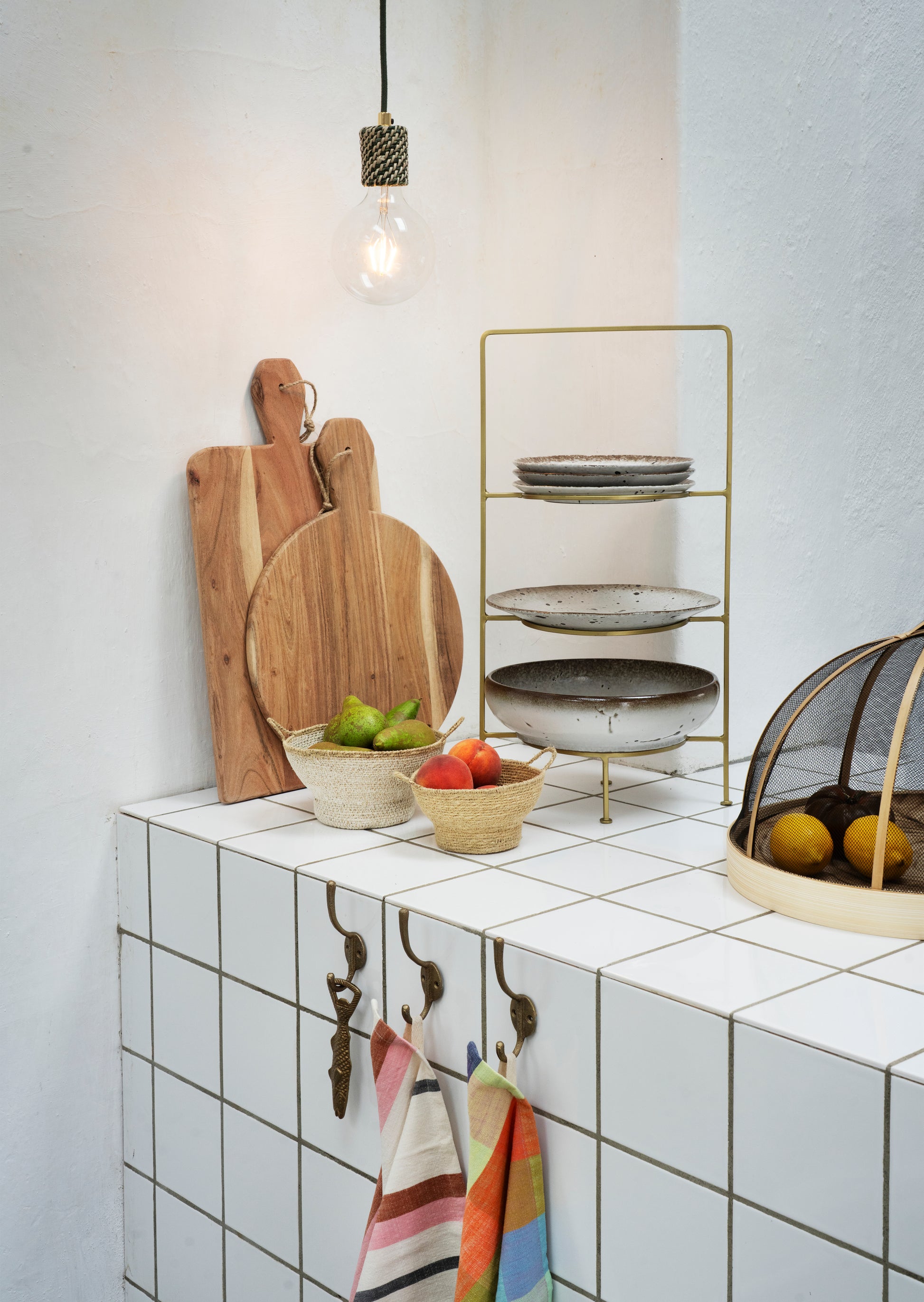 Round seagrass baskets in taupe, white and natural | Minerva Interiors